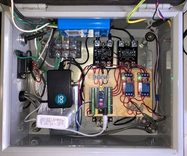 electrical enclosure for swarf dewatering mechanism. Arduino nano module, power supplies, relay modules and lots of neatly organized wiring.