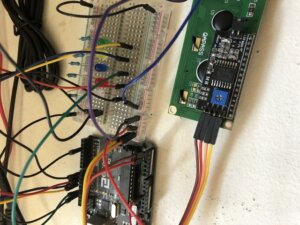 Arduino UNo hooked up to LEDs on breadboard and LCD display. Appears to be for prototyping