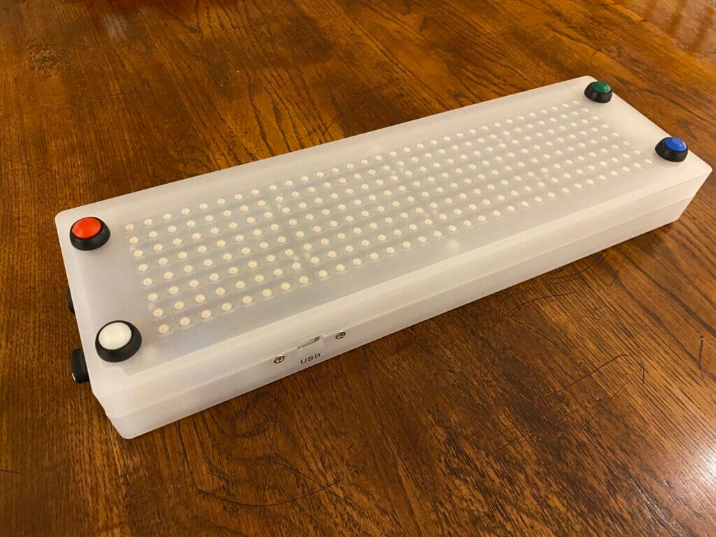 digital cribbage board with white case and buttons